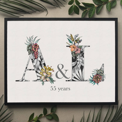 Personalised initial digital print of A & L. Initials are filled with fine liner drawings of imagery found in the rainforest. Butterflies, toucan, frog, tropical trees are included. Underneath initials ’55 years’ is printed.