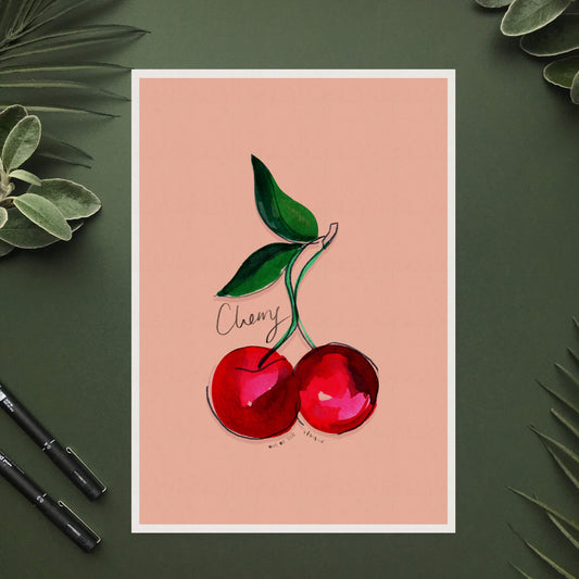 A digital print with a hand-painted cherry on a pink background with text ‘cherry’ hand written on it.