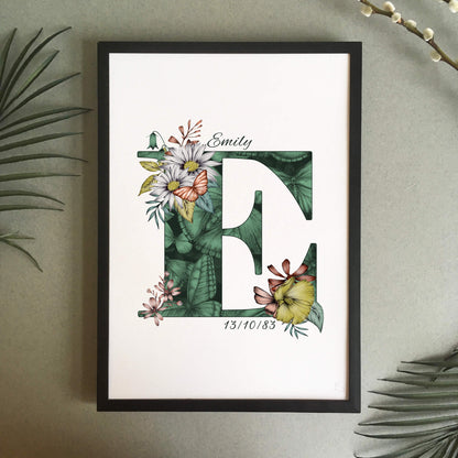 Personalised initial E print is filled with fine liner drawings of butterflies and flowers with a green theme and personalised with the recipients name and date of birth.