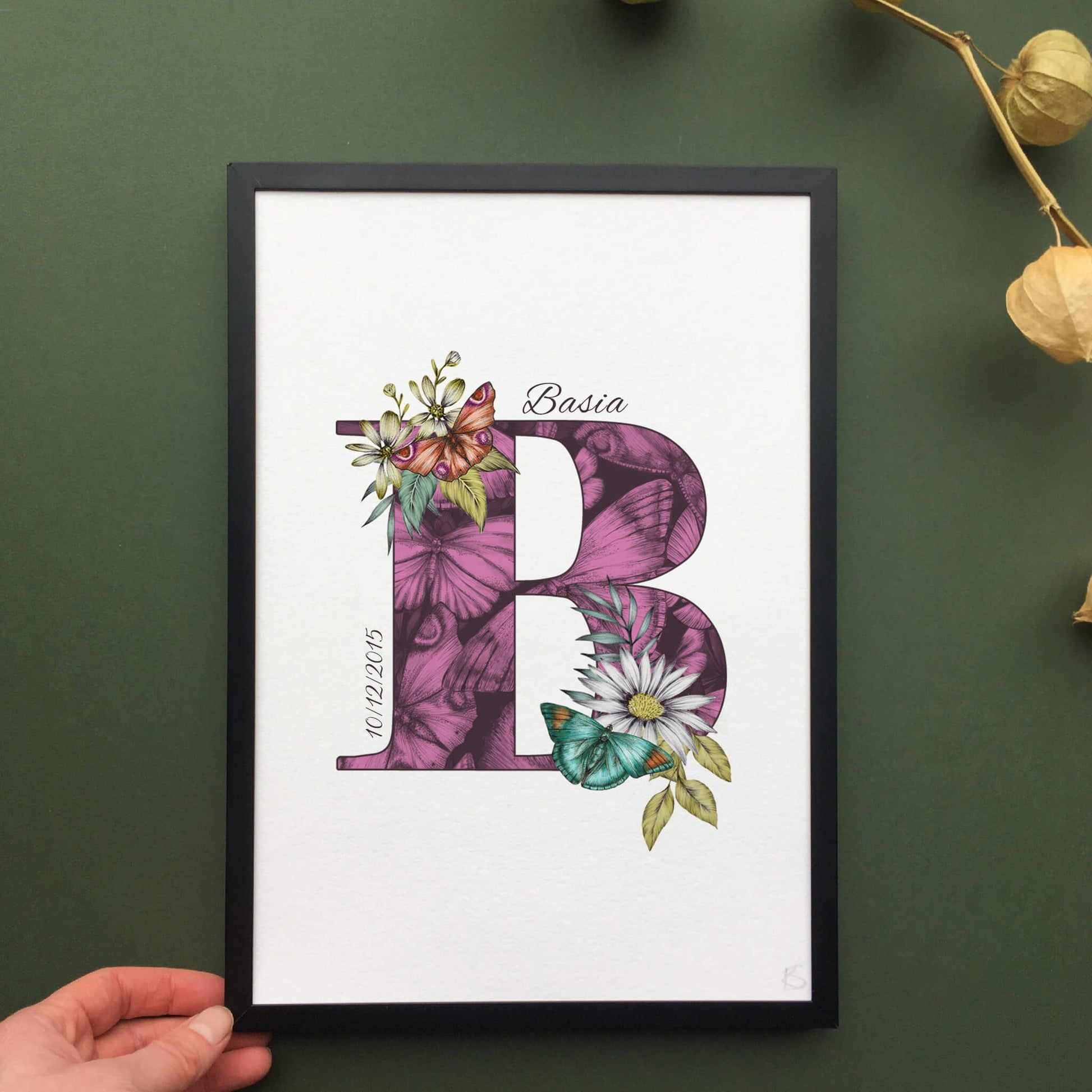 Personalised initial B print is filled with fine liner drawings of butterflies and flowers with a green theme and personalised with the recipients name and date of birth.