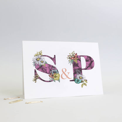 Purple personalised moving in card with S & P initials filled with hand-drawn butterflies and flowers. 