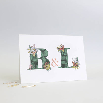 Green butterfly themed personalised initial new home card with b & l initials filled with hand-drawn butterflies and flowers. 