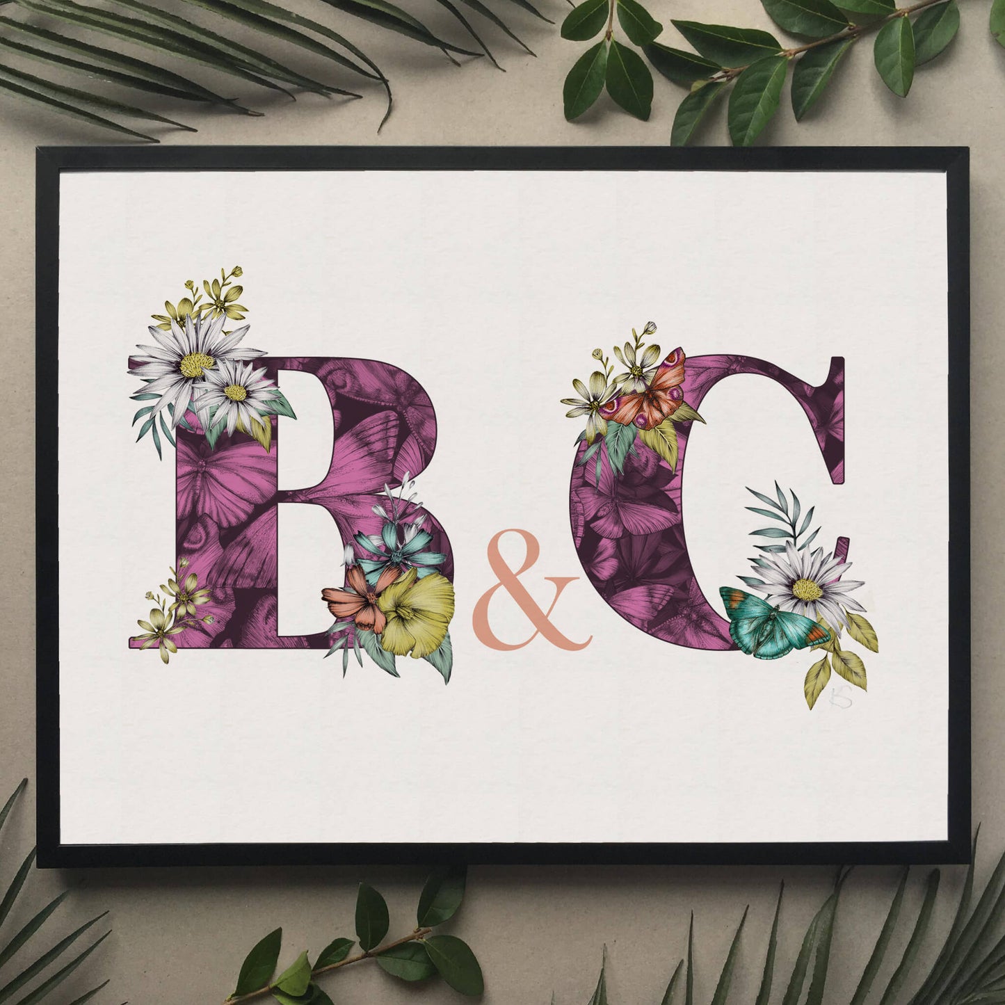 Personalised initial digital print of B & C. Initials are filled with fine liner drawings of butterflies and flowers. Print is framed and surrounded with green leaves.