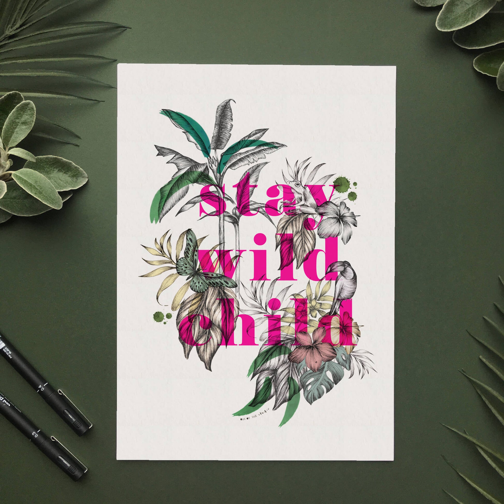 Art print created with fine liner drawings of imagery found in the rainforest. Butterflies, toucan, frog, tropical trees are included. In the centre of the artwork the wording “stay wild child’ is printed in a bright neon pink colour.